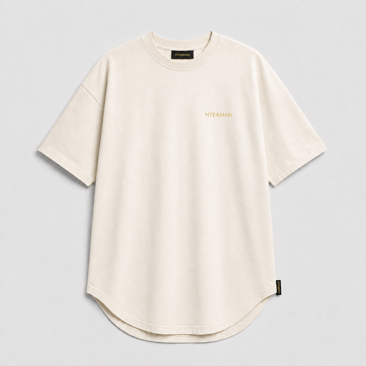 Ivory Longline Tee Brushed Gold Wordmark Single